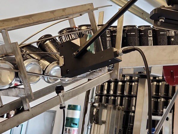 Date Coding Machine RNJet H1 installed on the canning twister for CASC canning line